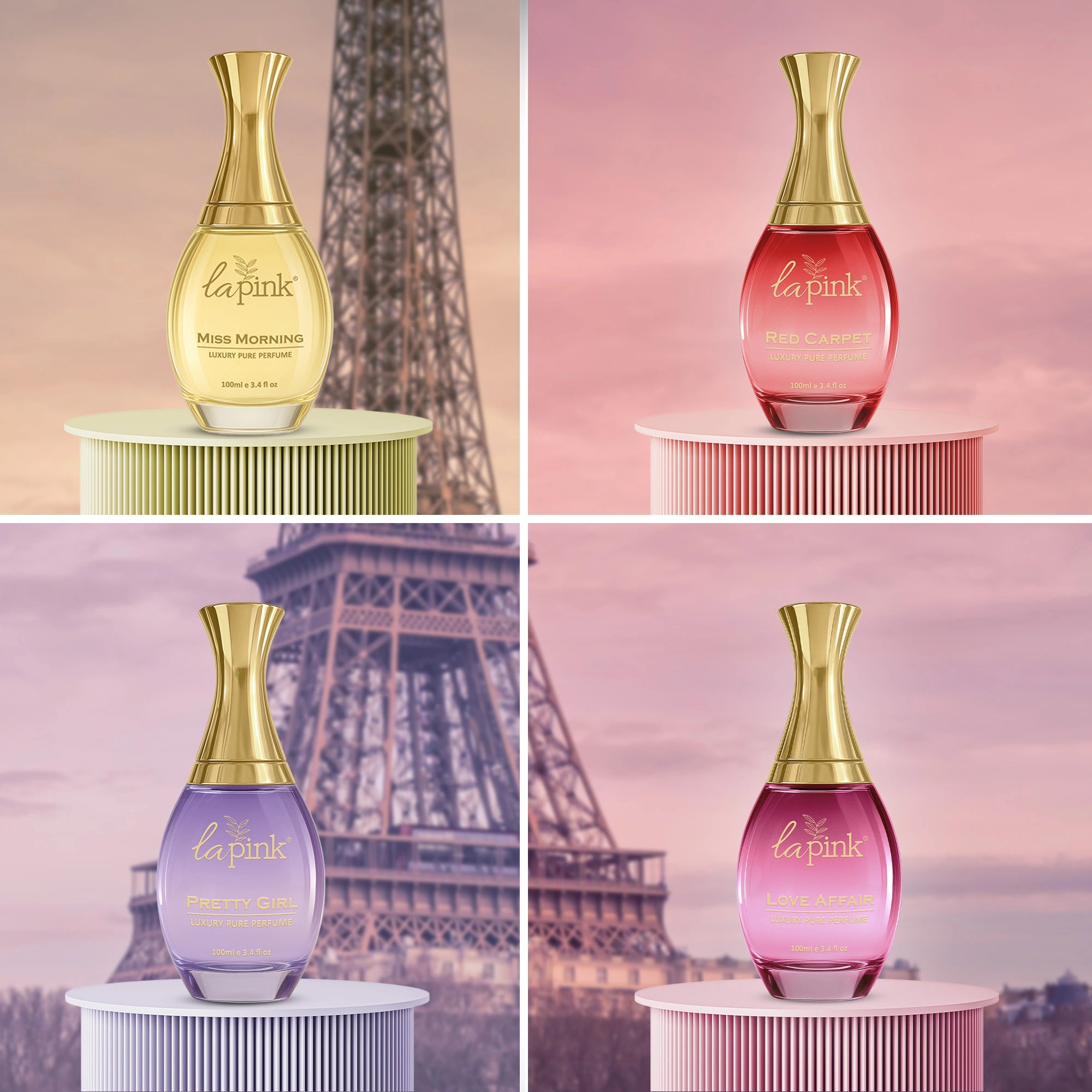Four different colored perfume bottles with gold caps on a stand against a blurred Eiffel Tower background.