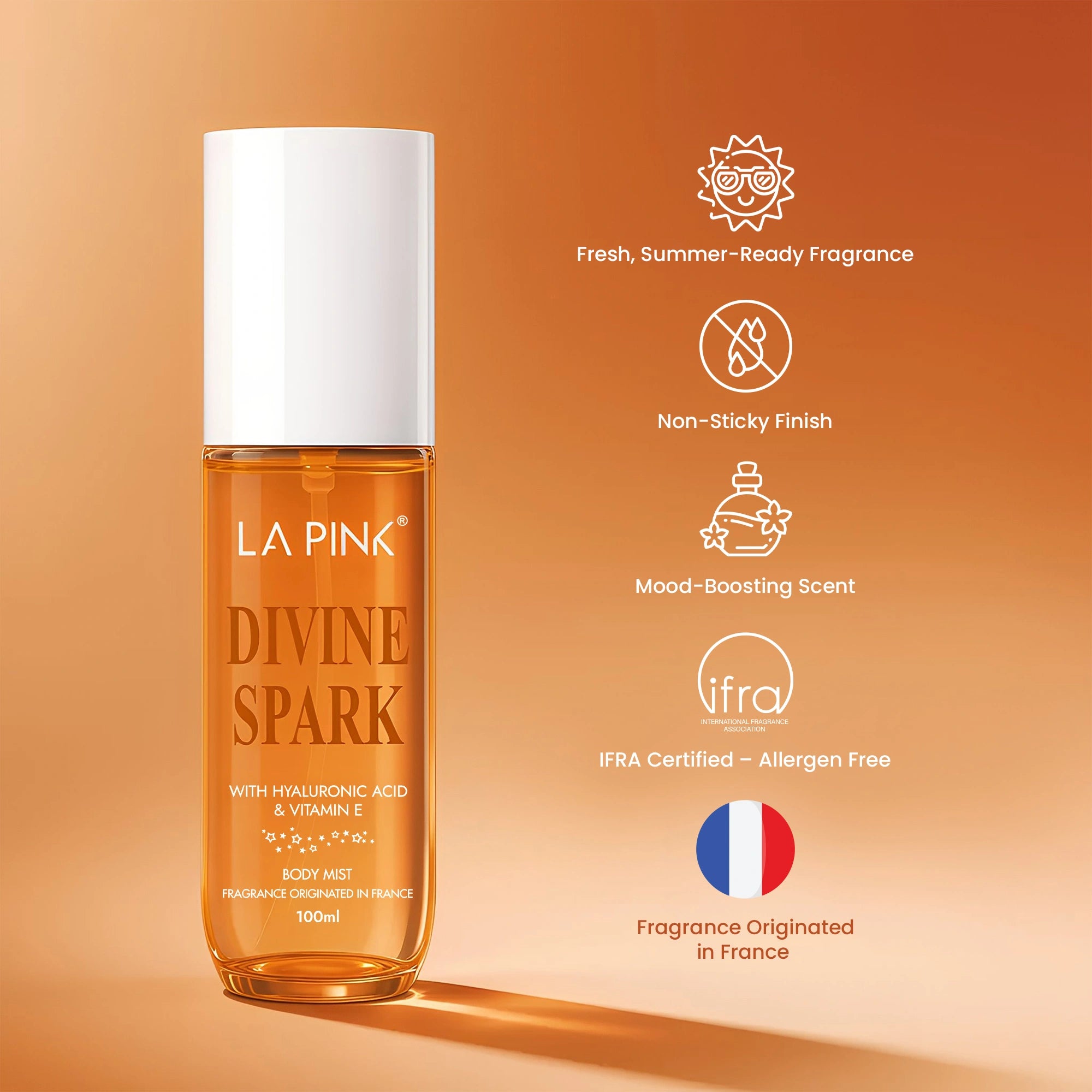 LA Pink Divine Spark bottle on an orange background with product features listed.