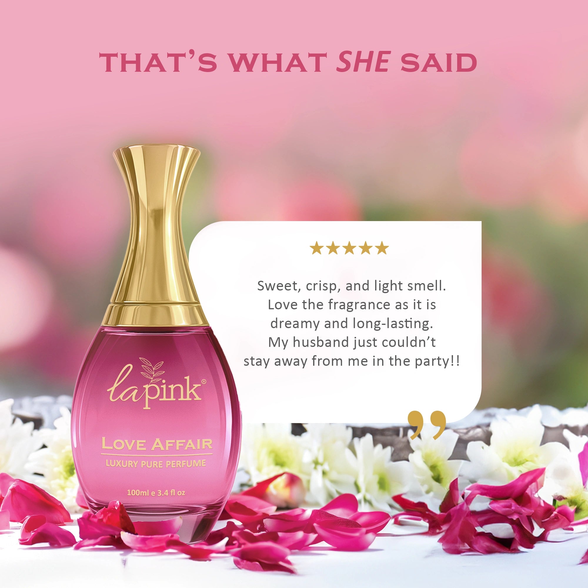Pink perfume bottle with gold cap on a pink background, surrounded by flowers.