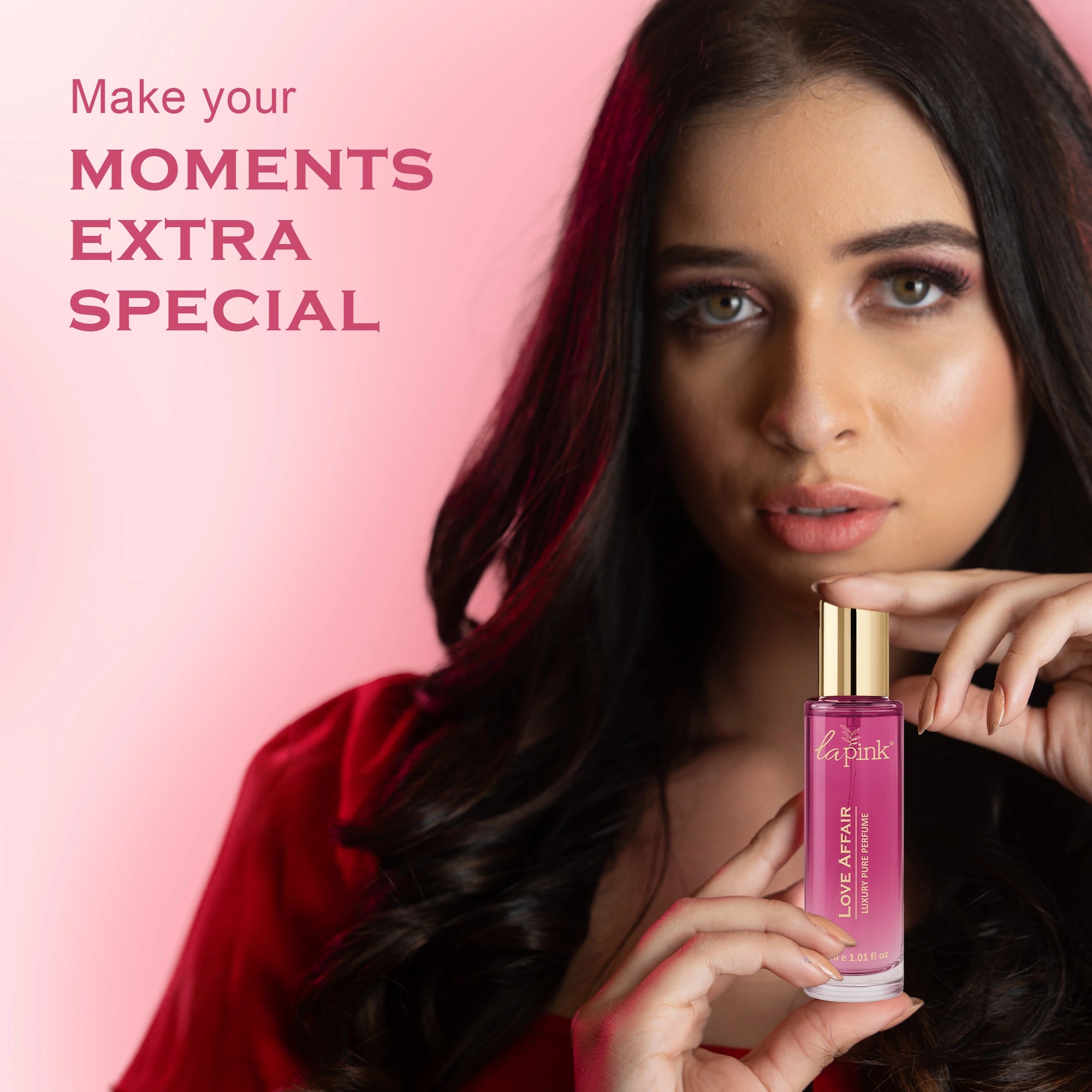 Woman holding a pink bottle with text &