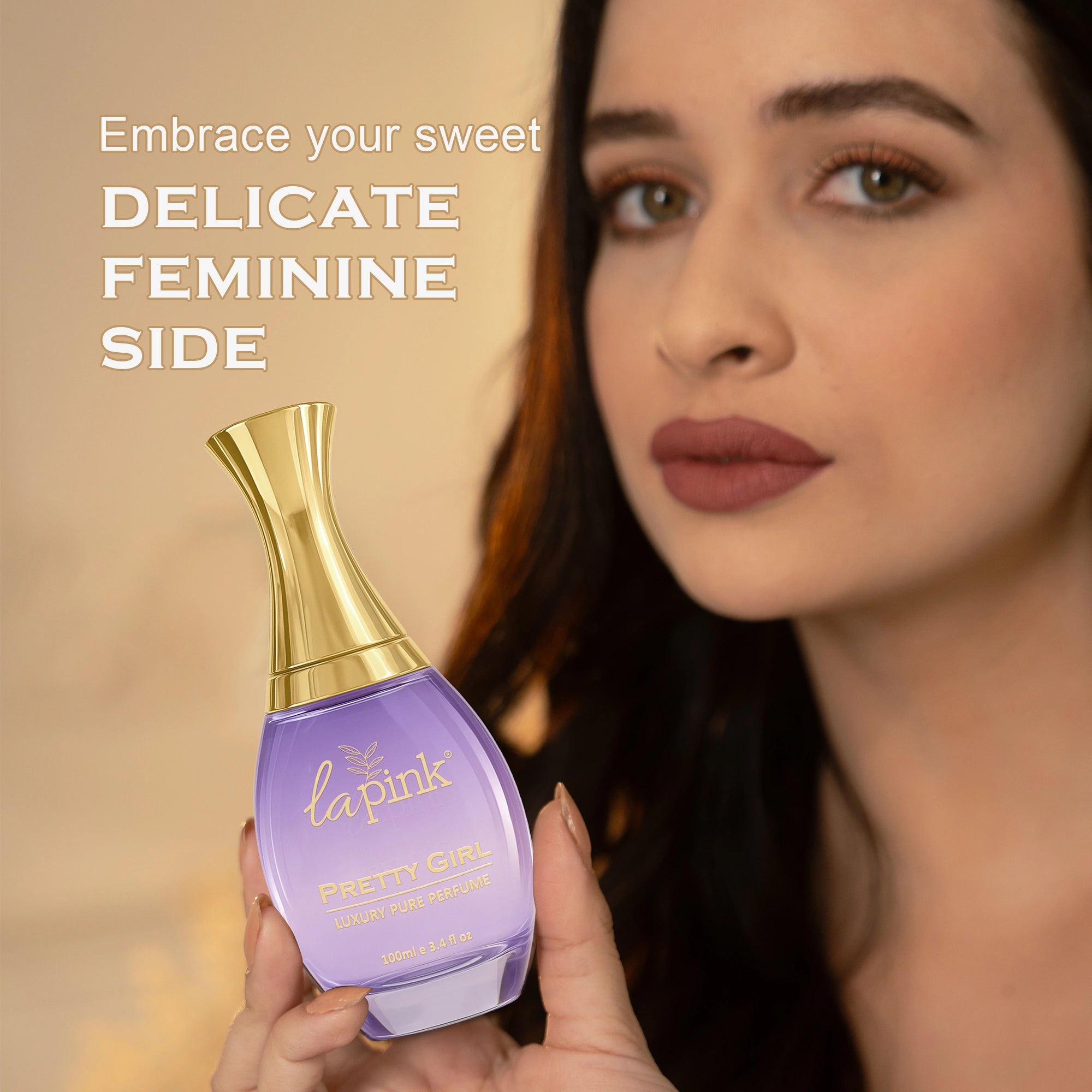 Woman holding a purple nail polish bottle with gold cap, text &