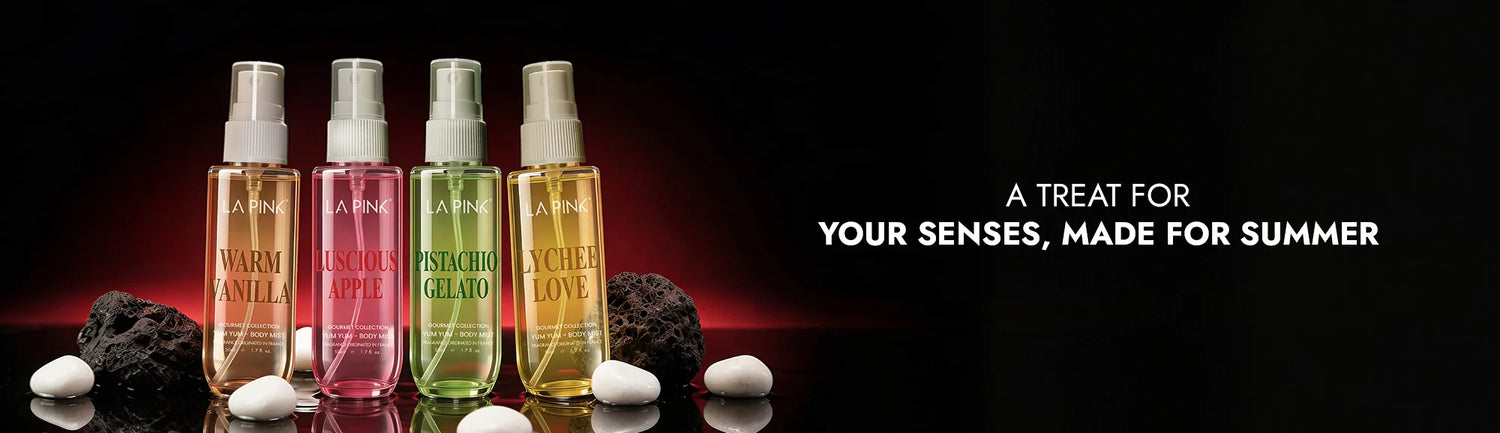 Four bottles of scented products with a dark background and text &