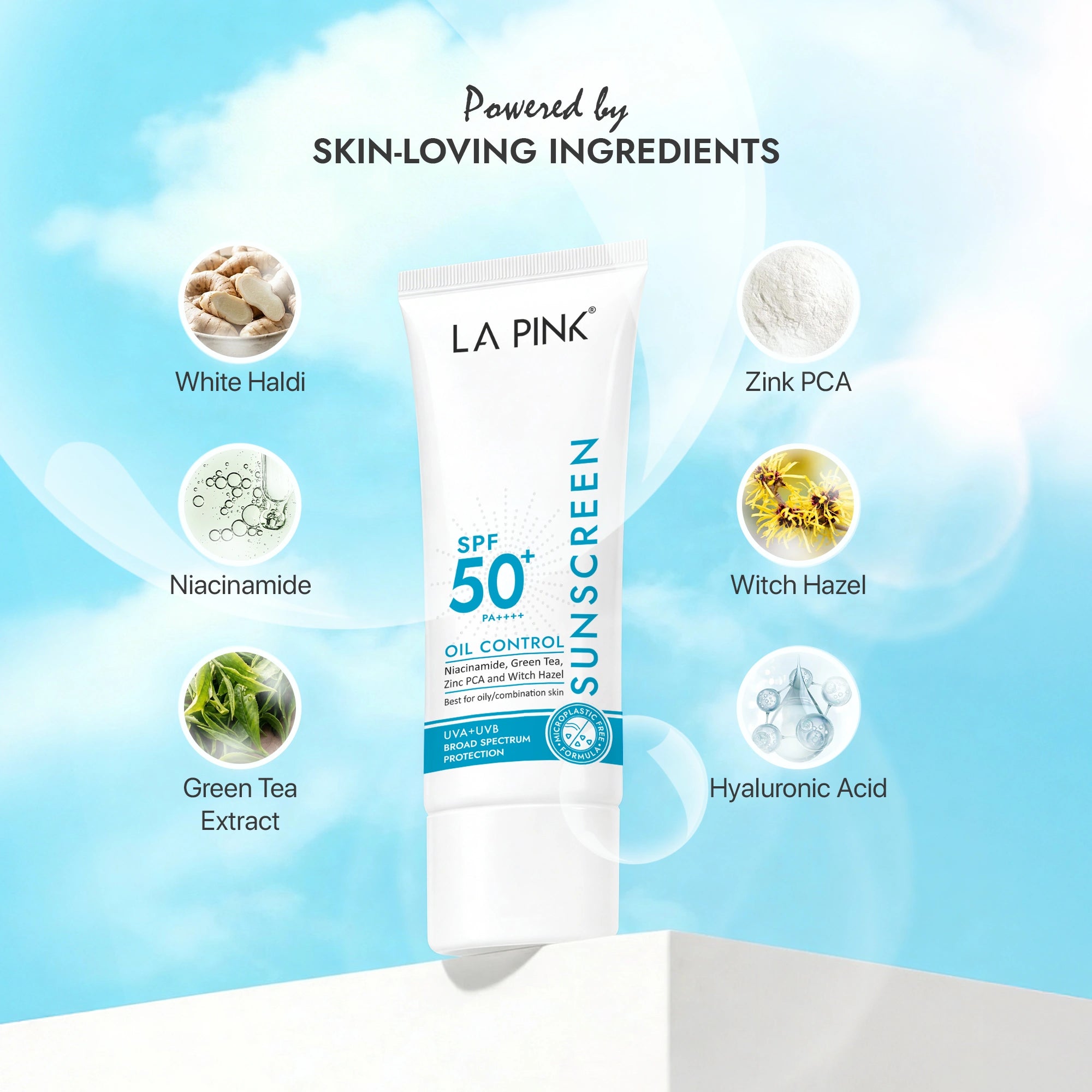 LA Pink sunscreen tube with skin-loving ingredients on a blue sky background