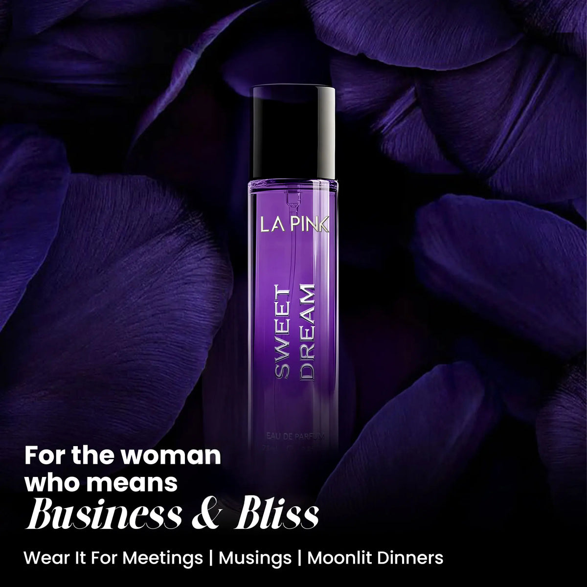 LA PINK Sweet Dream Eau de Parfum bottle in purple glass with a black cap, set against a dark background of purple petals. 