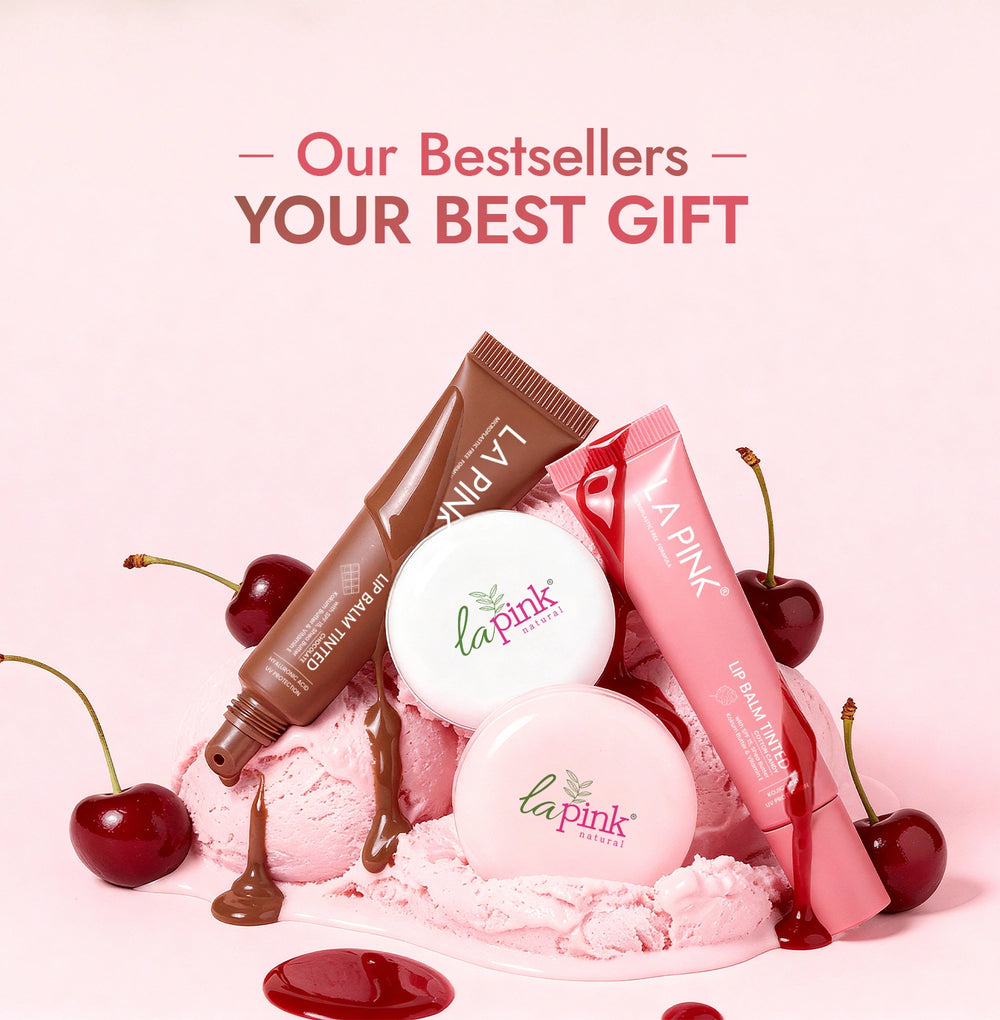 Cosmetic products with 'La Pink' branding on a pink background with cherries.