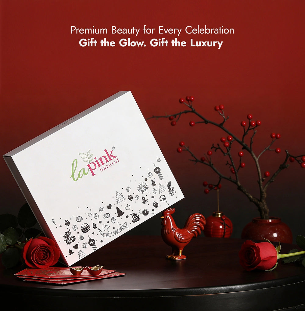 White gift box with decorative elements on a dark surface with red accents