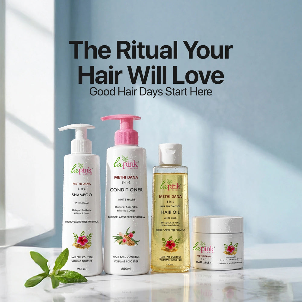 Set of hair care products with 'La Pink' branding on a light background