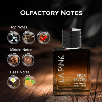 LA PINK Hot Look pure perfume bottle on a dark wooden background with &