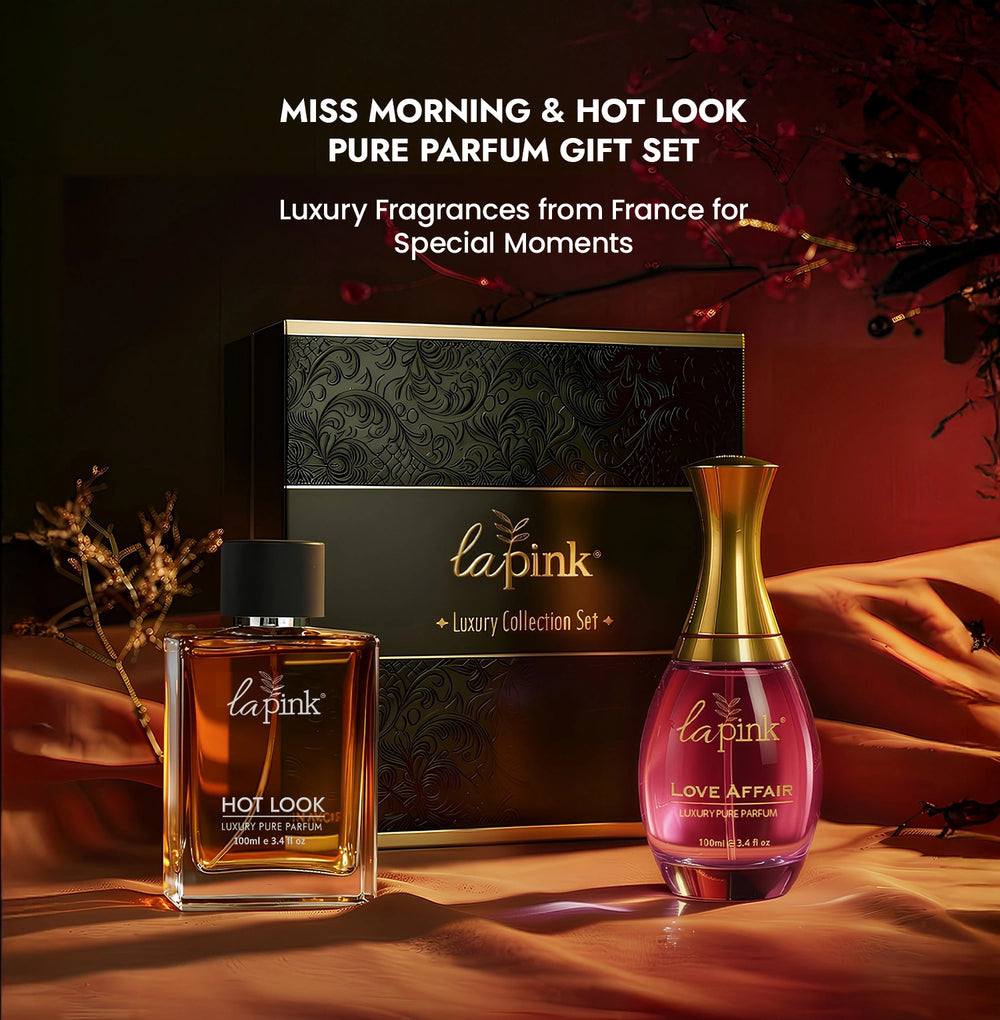 Two perfume bottles with a box labeled 'lapink' on a dark background