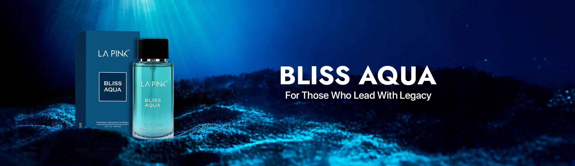 La Finest Bliss Aqua perfume bottle with packaging on a blue gradient background