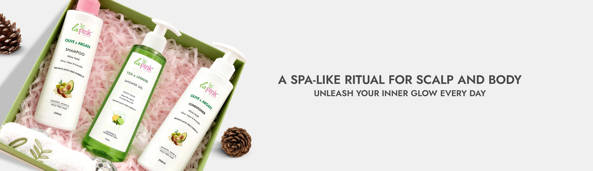 Cosmetic set with bottles and a box on a textured surface, accompanied by text about a spa-like ritual.