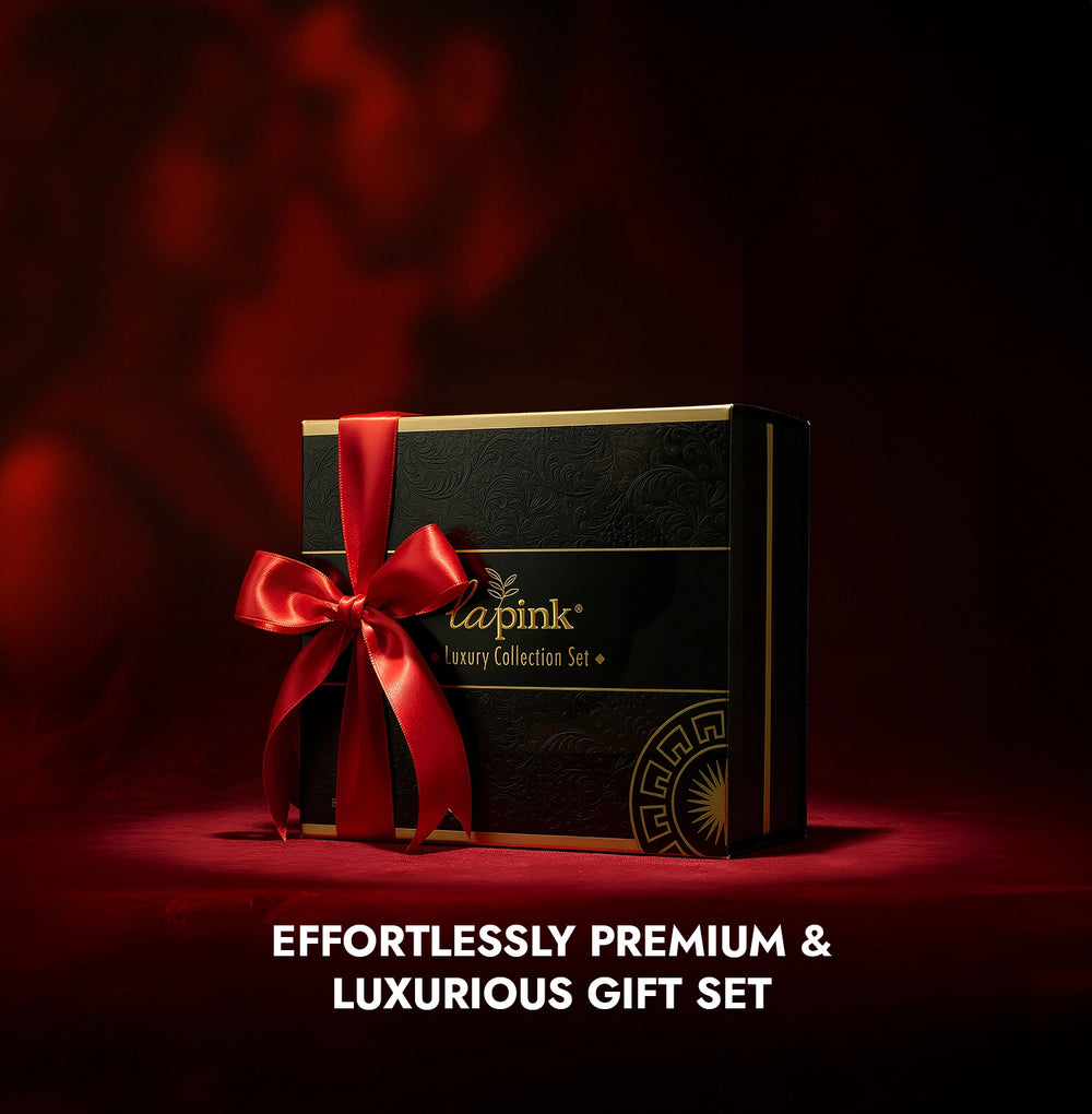 Luxurious gift set with a red ribbon on a dark background