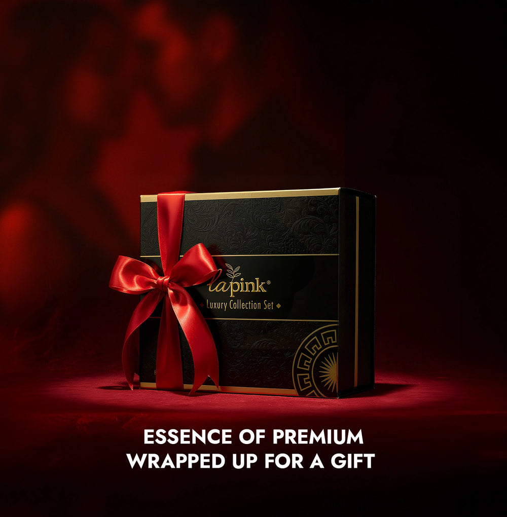 Luxury gift box with a red ribbon on a dark background