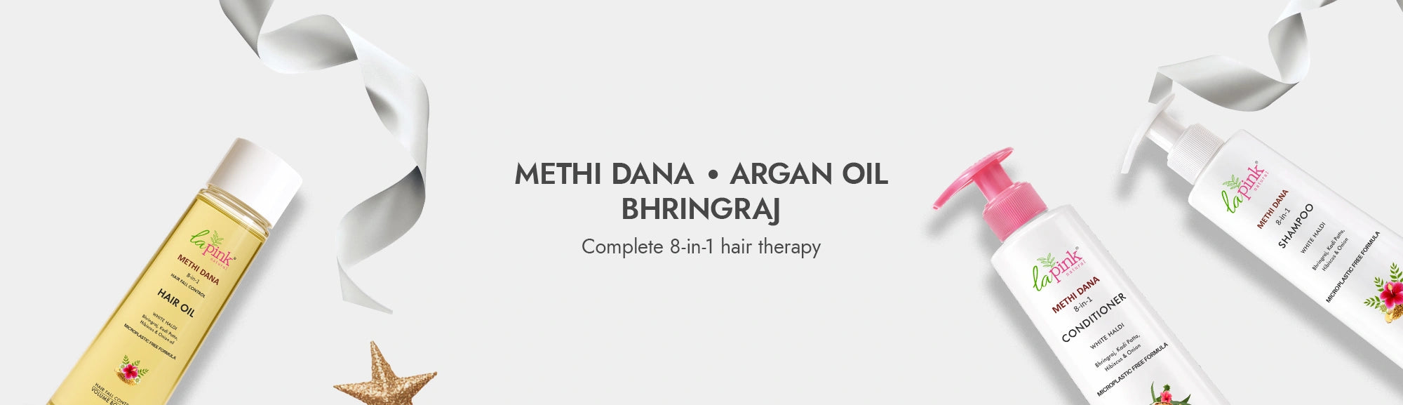 Hair care products including oil, shampoo, and conditioner on a white background with 'Methi Dana' branding.