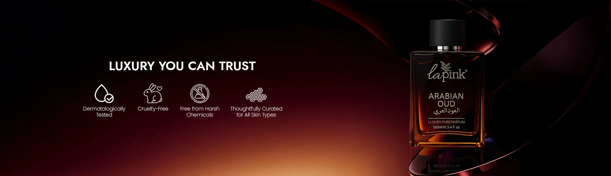 La Pink Arabian Oudh perfume bottle with certification icons on a dark background