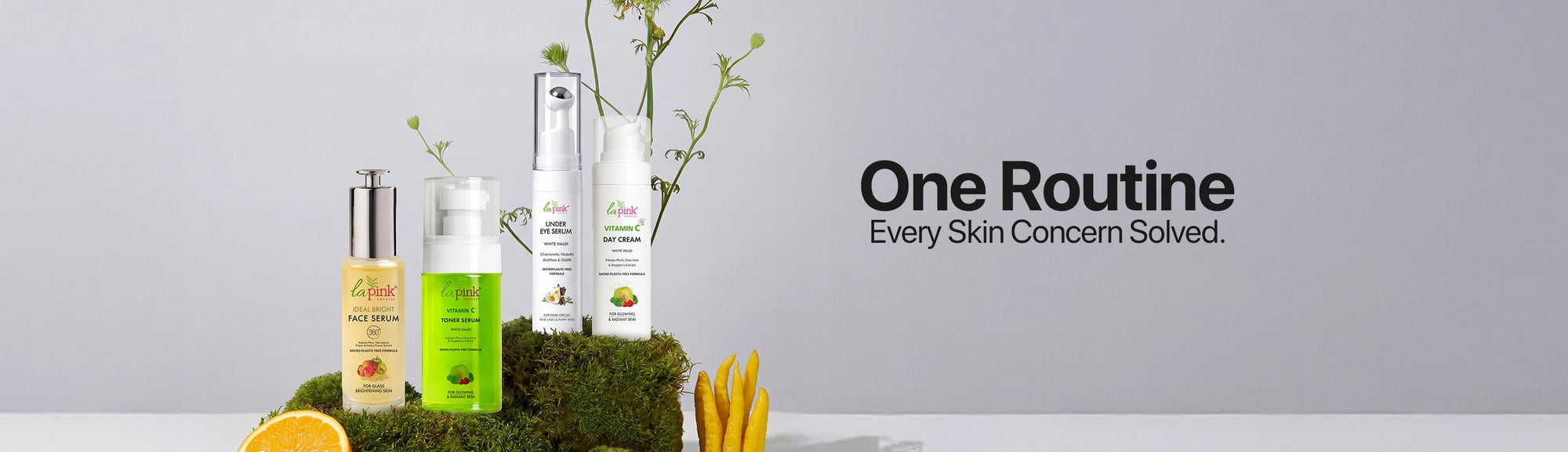 Cosmetic products with 'One Routine' branding on a gray background