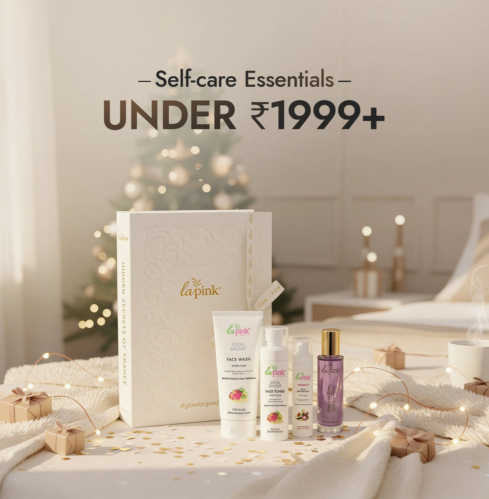 Cosmetic set with 'lapink' branding on a decorative table with soft lighting.