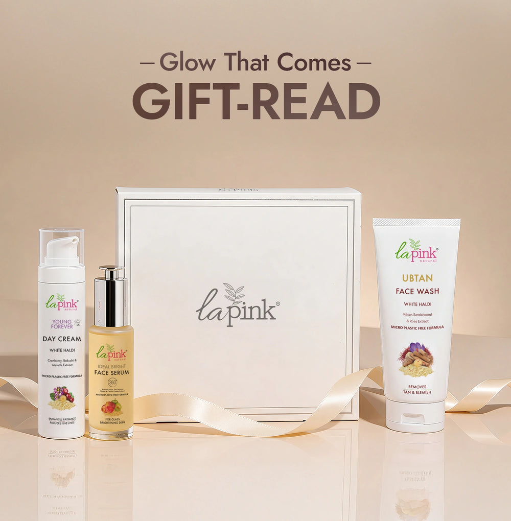 La Pink skincare products including Day Cream, Serum, and Face Wash with a branded box on a beige background.